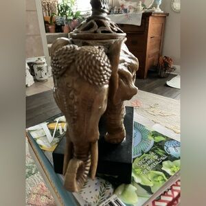 A very unique decorative Asian elephant with a lidded compartment.